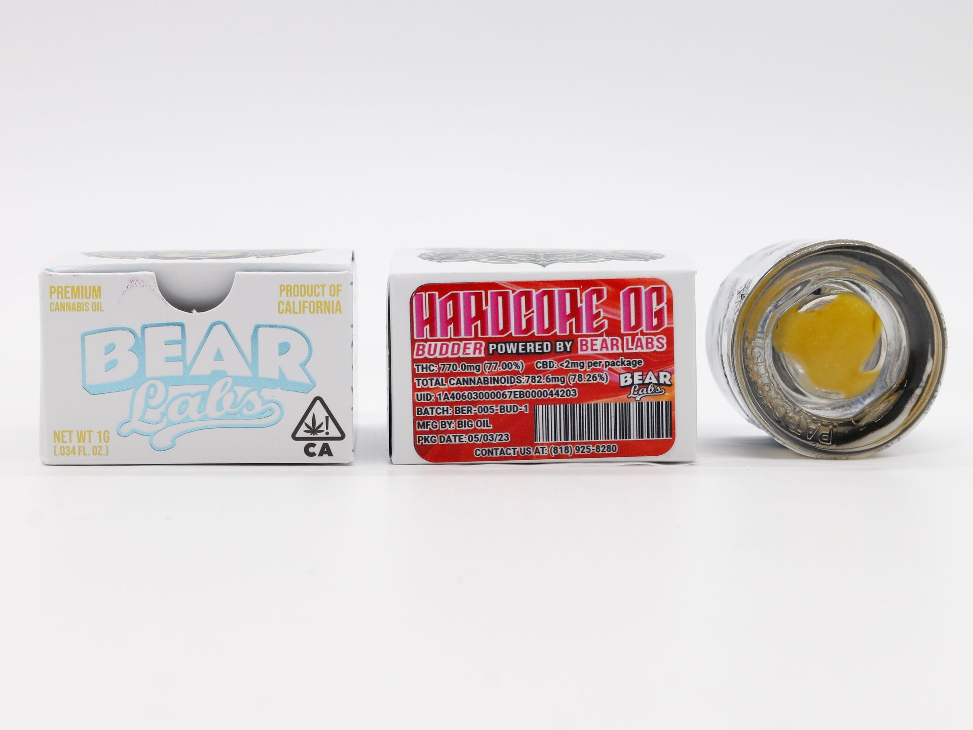 A box of bear bars next to a jar of bear bars.