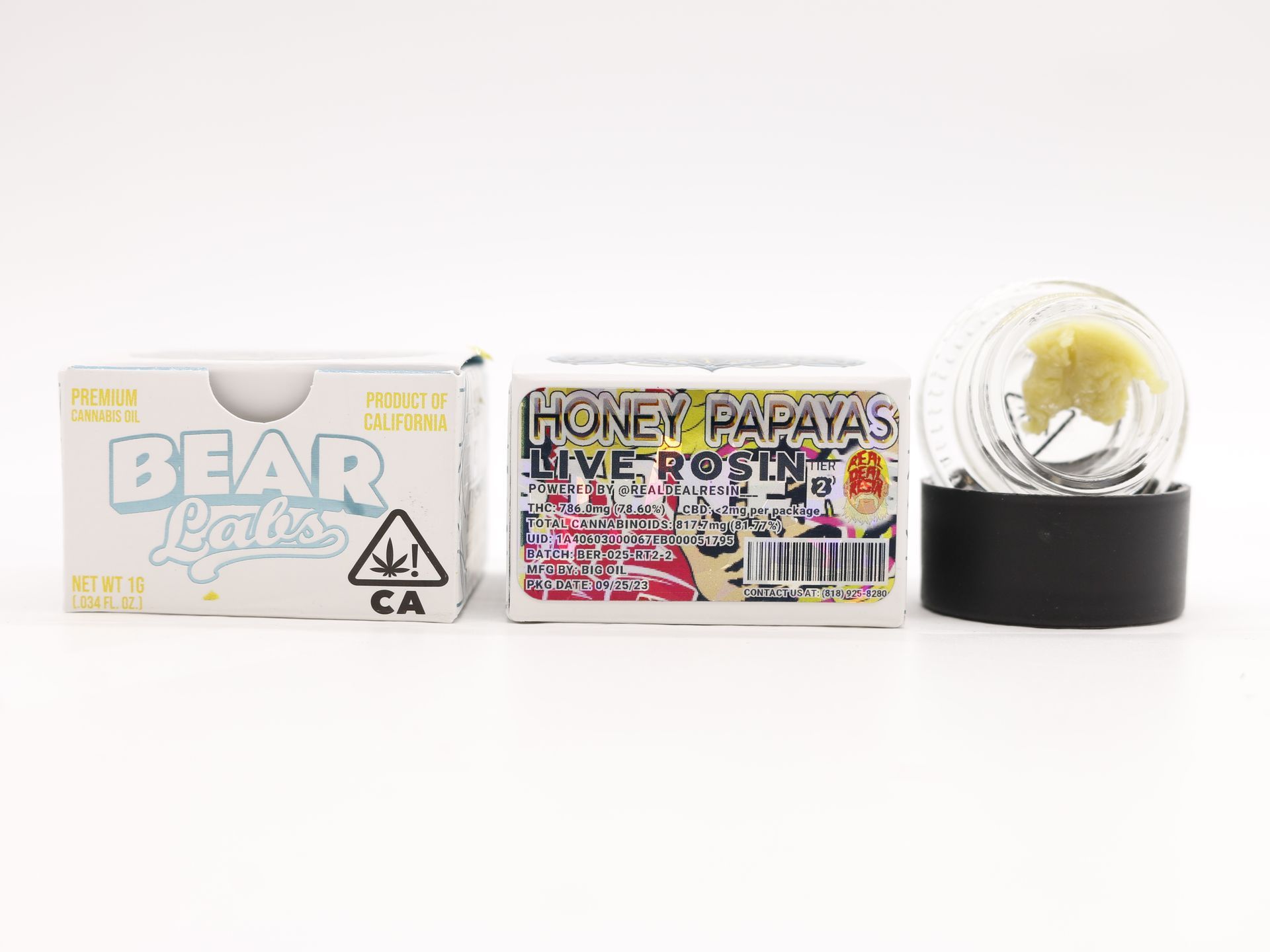 A box of bear labs next to a jar of Honey Papayas