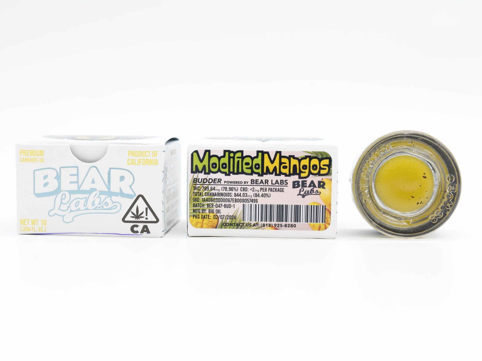 A box of bear labs next to a jar of Modified Mangos