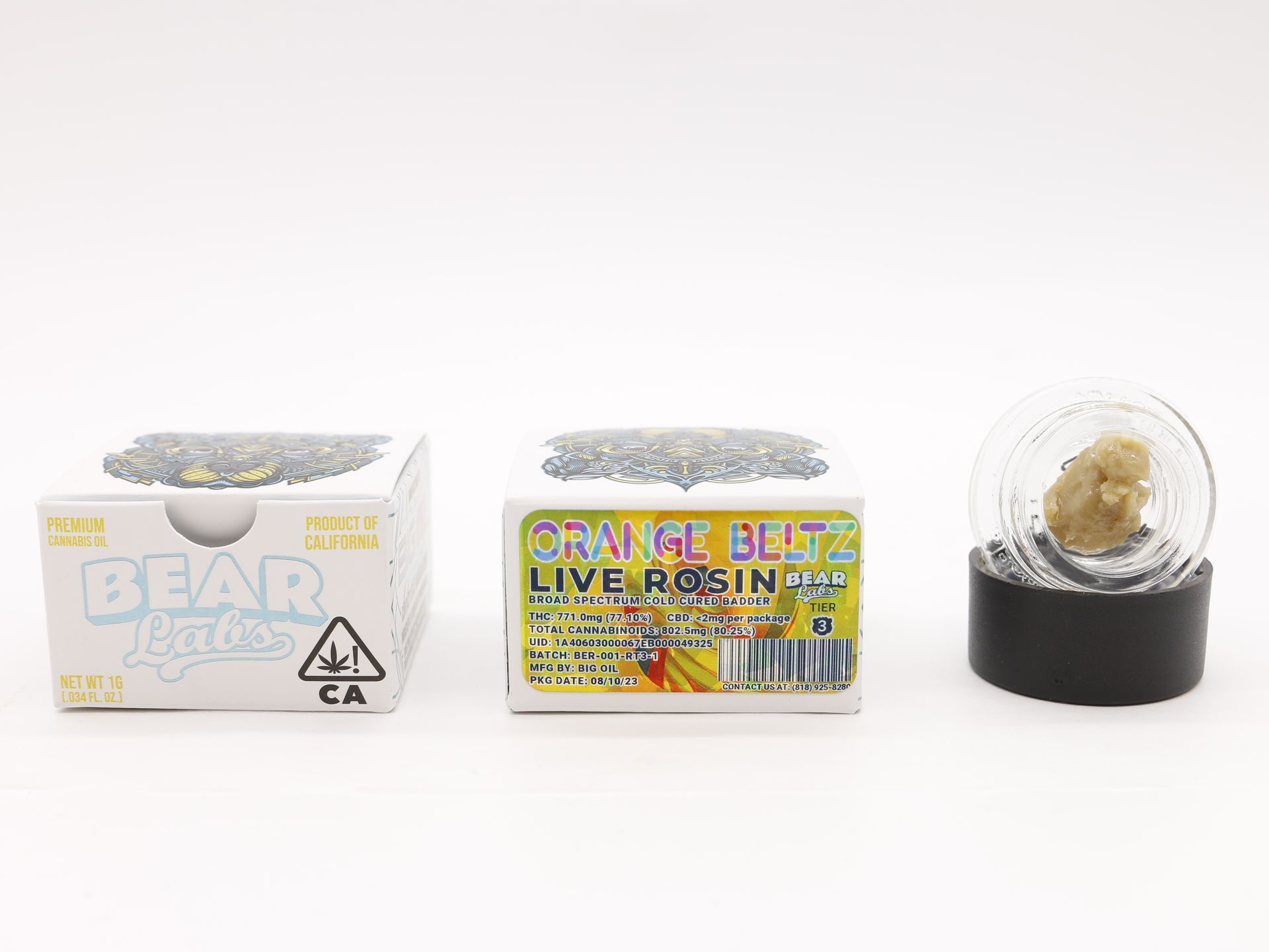 A box of bear labs next to a jar of Orange Beltz