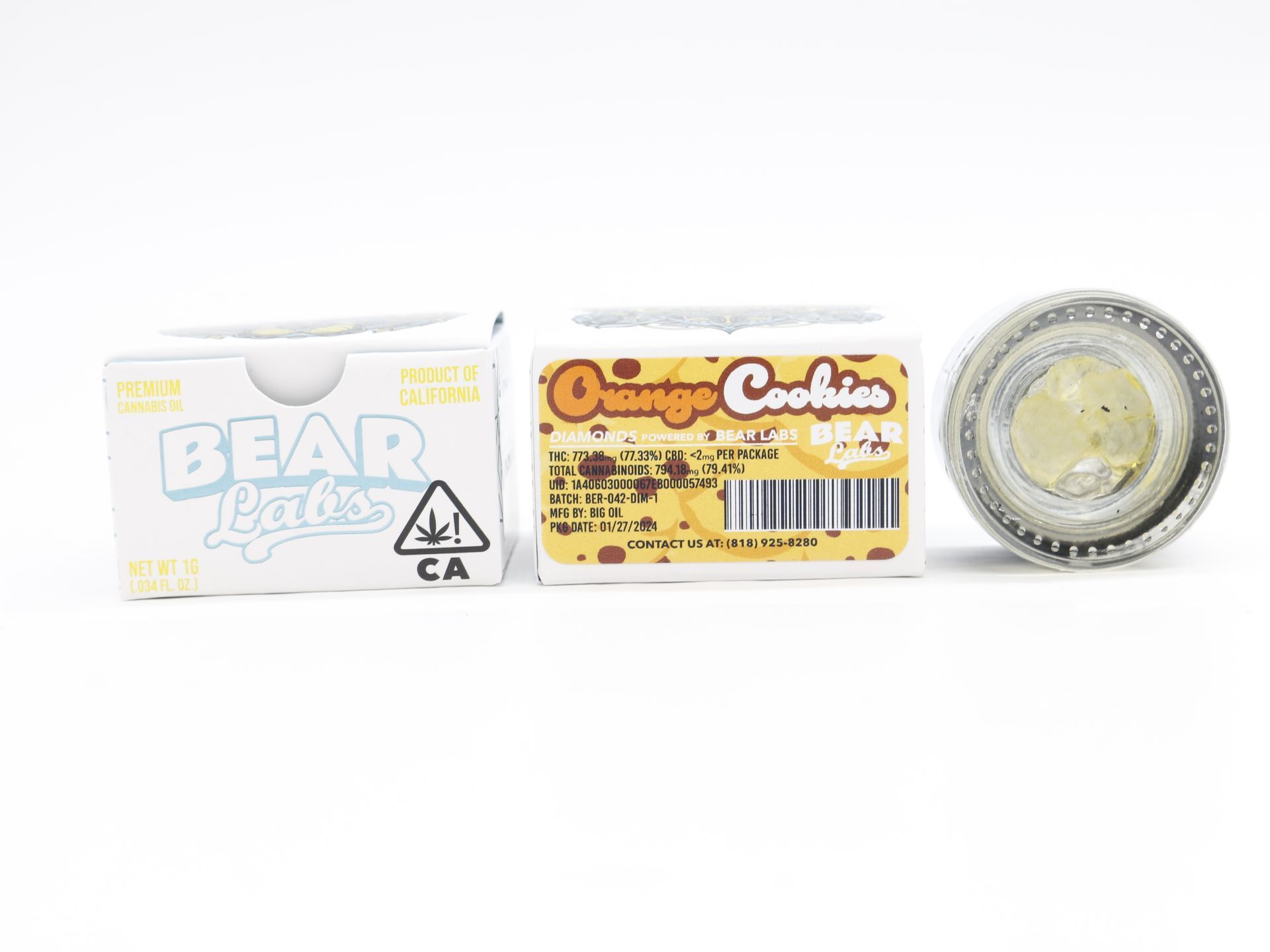 A box of bear labs next to a jar of Orange Cookies
