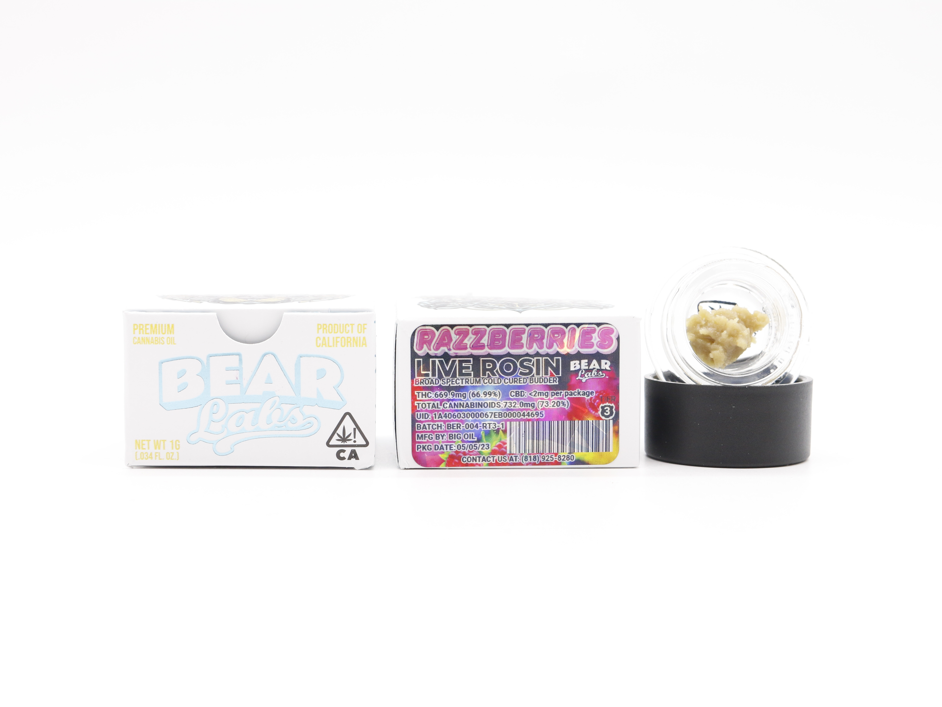 There is a snow globe with a teddy bear inside of it.