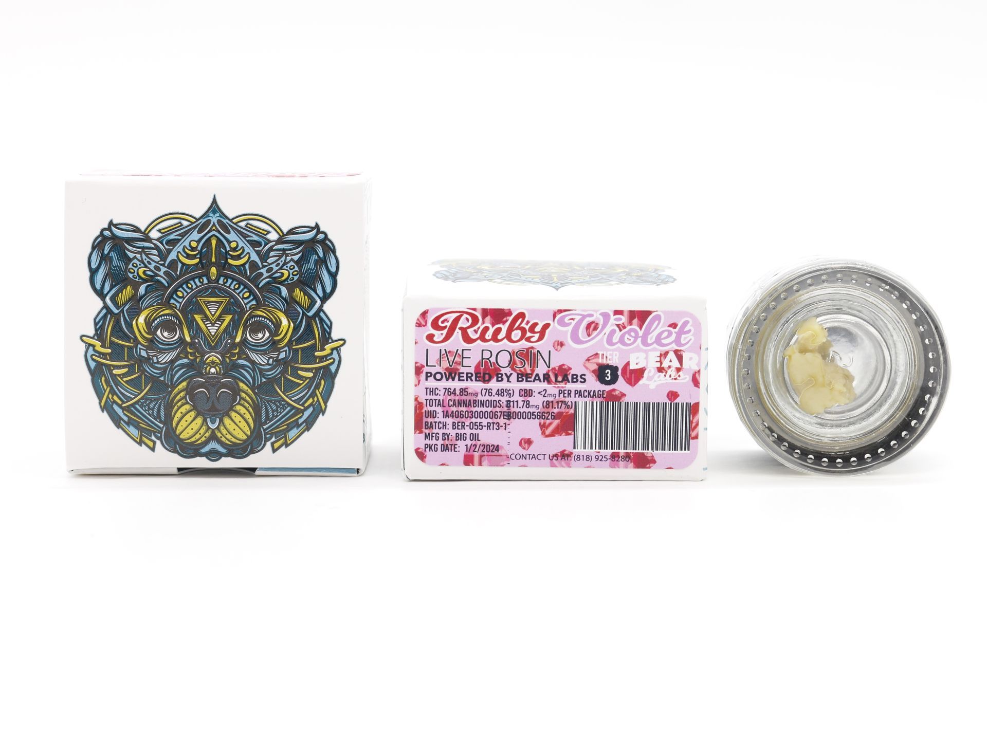 A box of bear labs next to a jar of Ruby Violet