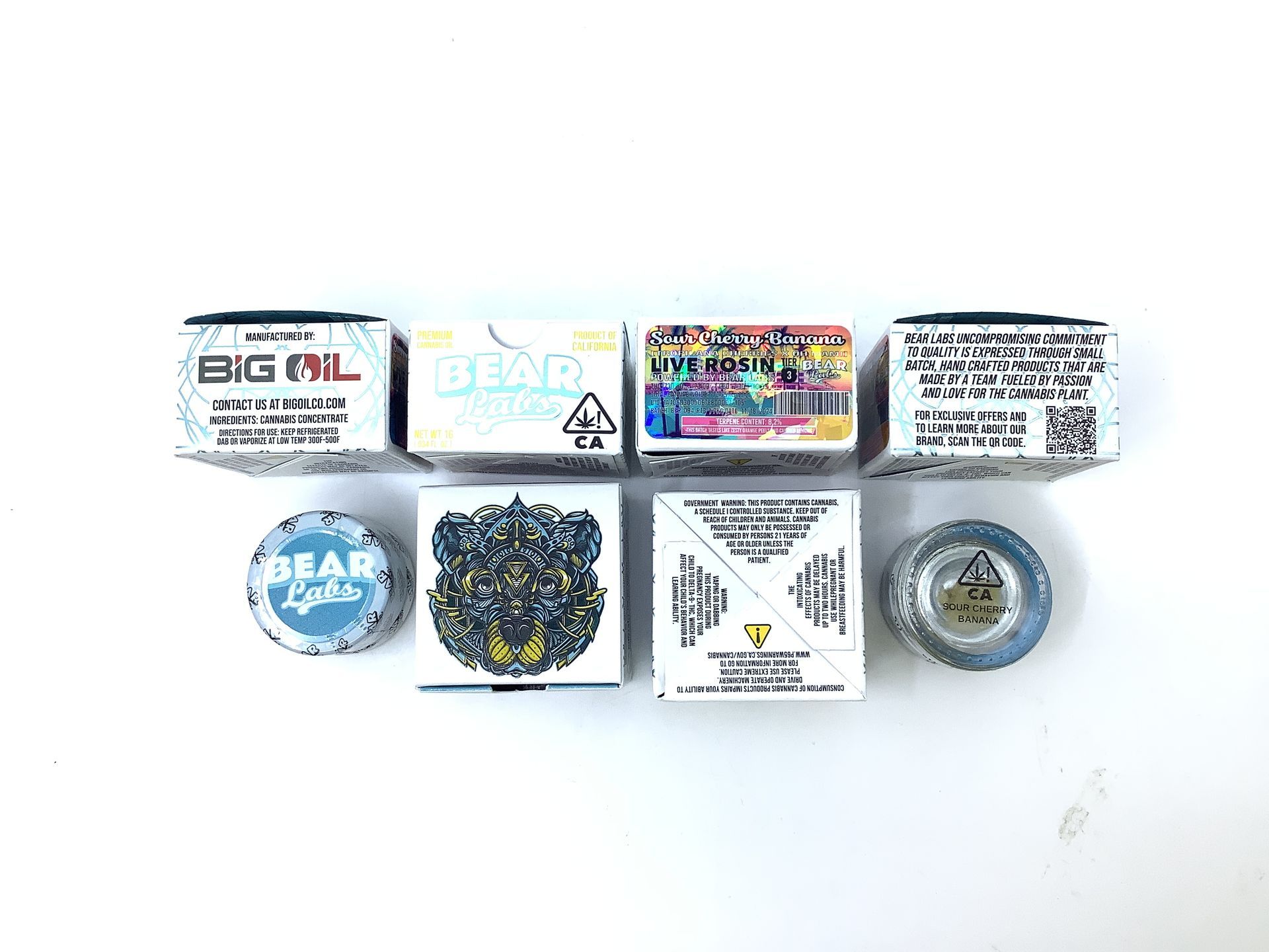 A box of bear labs next to a jar of Sour Cherry Banana
