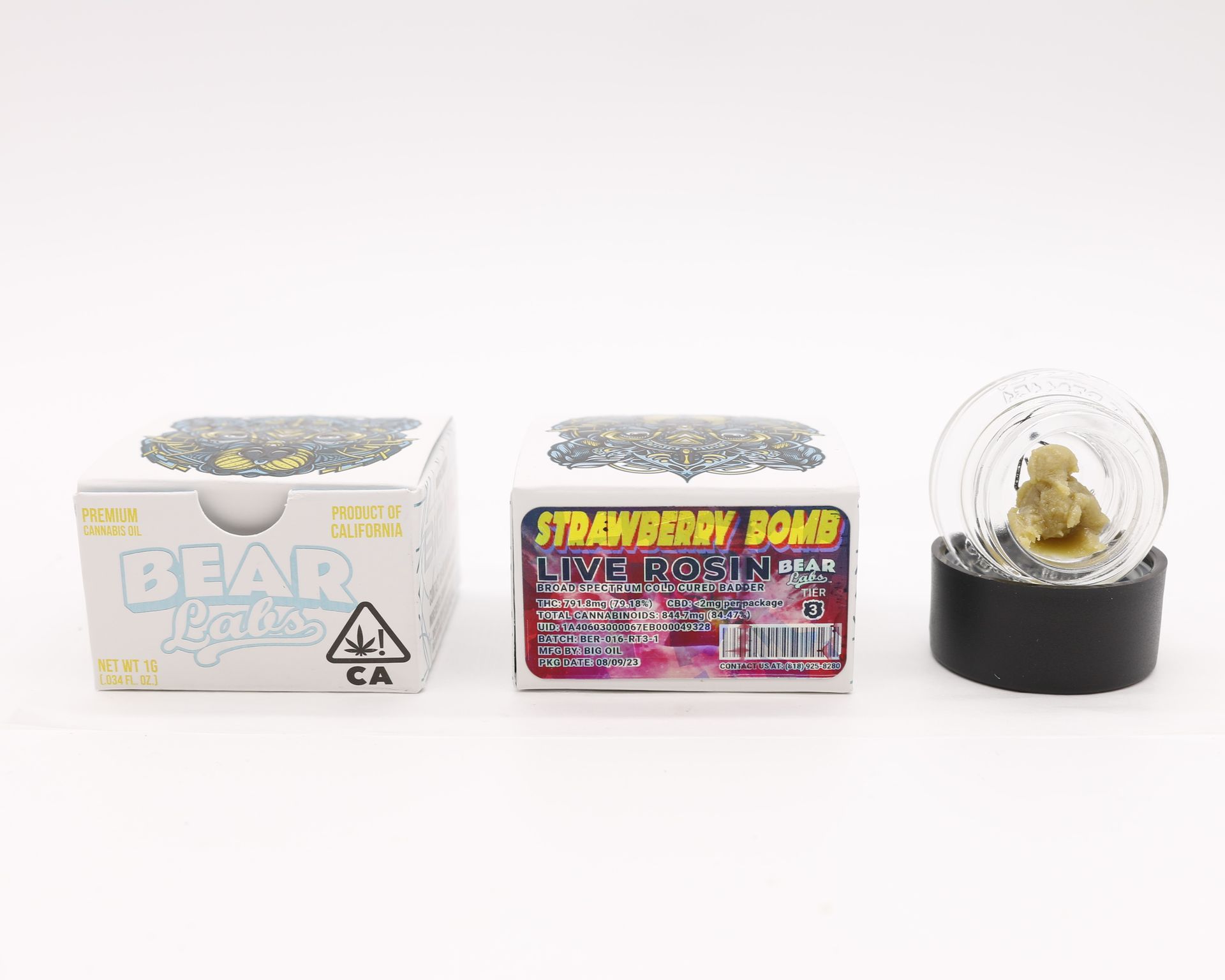 A box of bear labs next to a jar of Strawberry Bomb