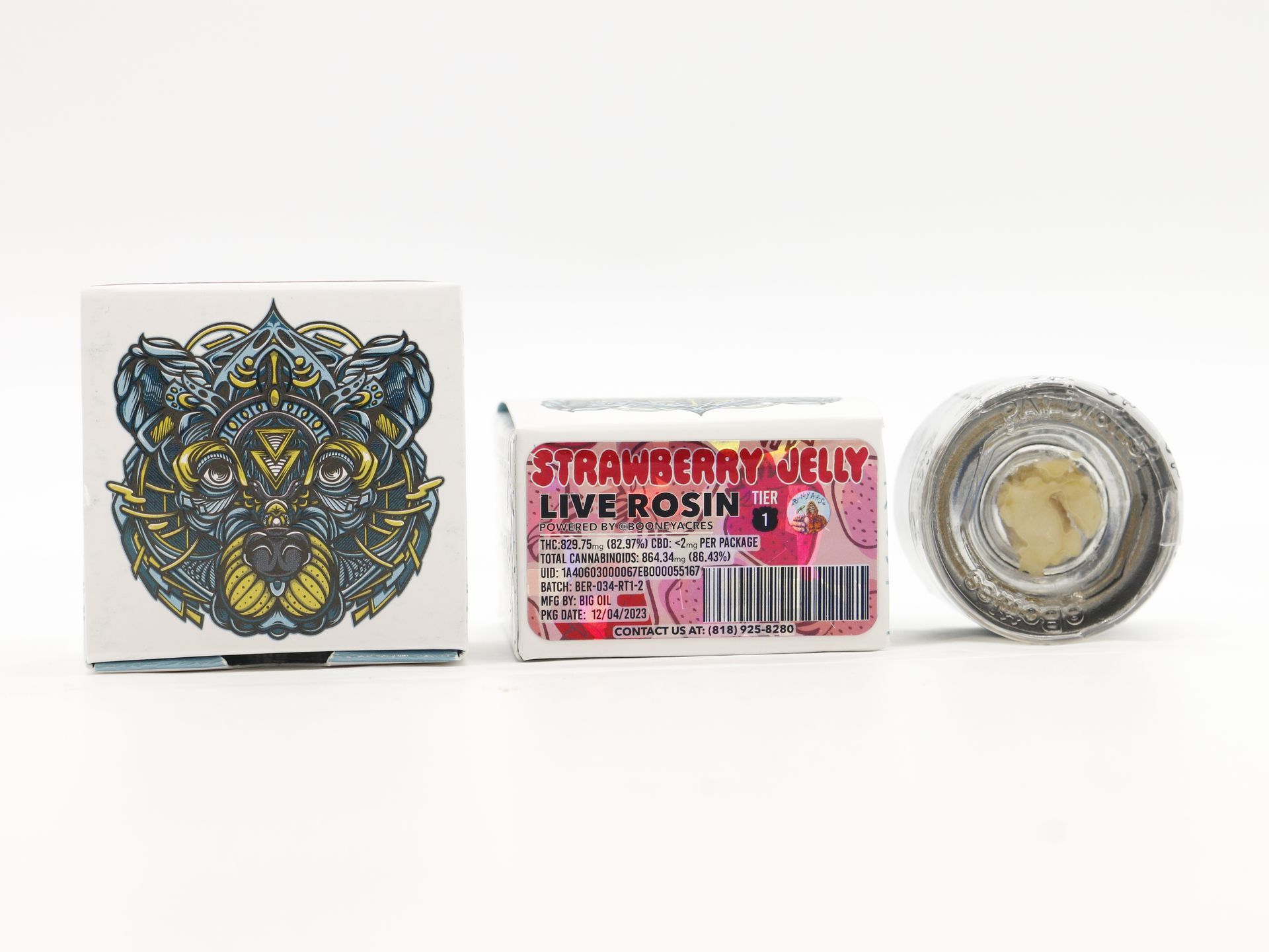 A box of bear labs next to a jar of Strawberry Jelly