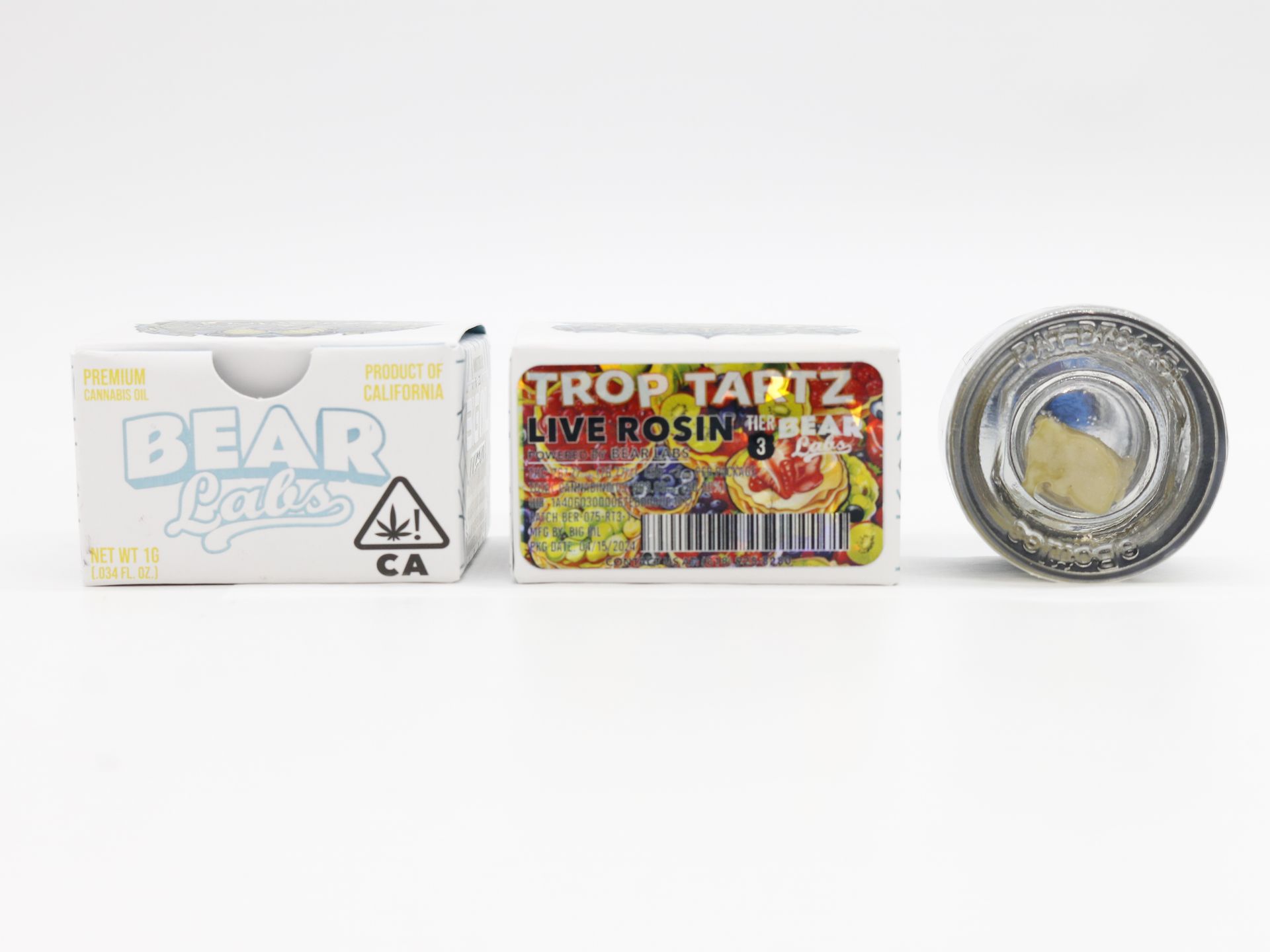 A box of bear labs next to a jar of Trop Tartz