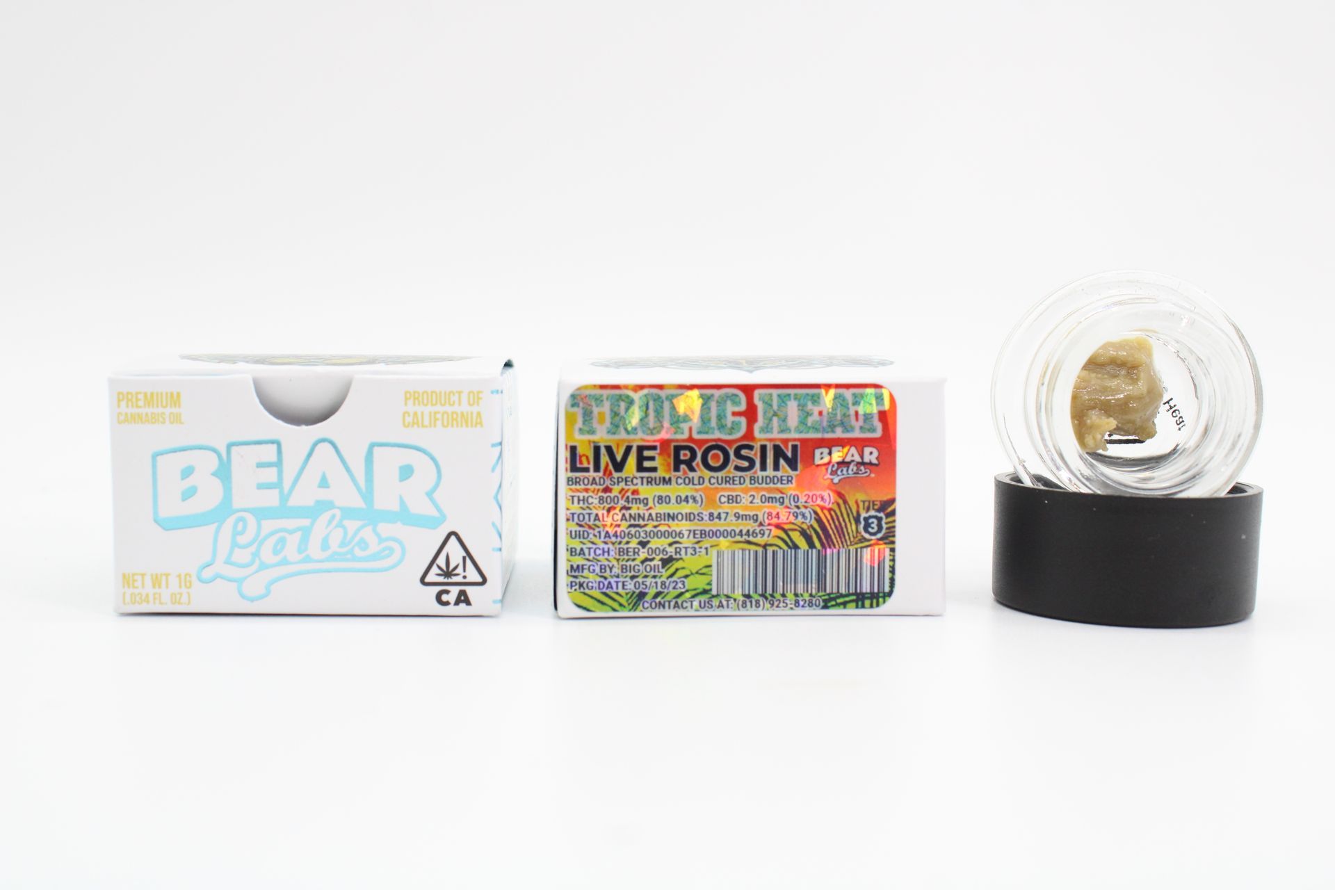 A box of bear labs next to a jar of Tropic Heat
