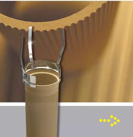 Eine Nahaufnahme eines Zylinders mit einem Metallring darum