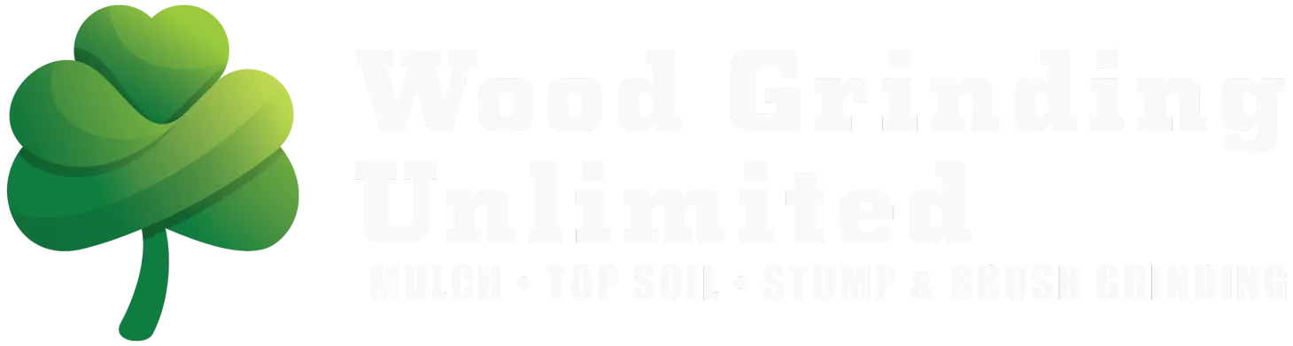 Logo for Wood Grinding Unlimited: A green shamrock graphic with white text.