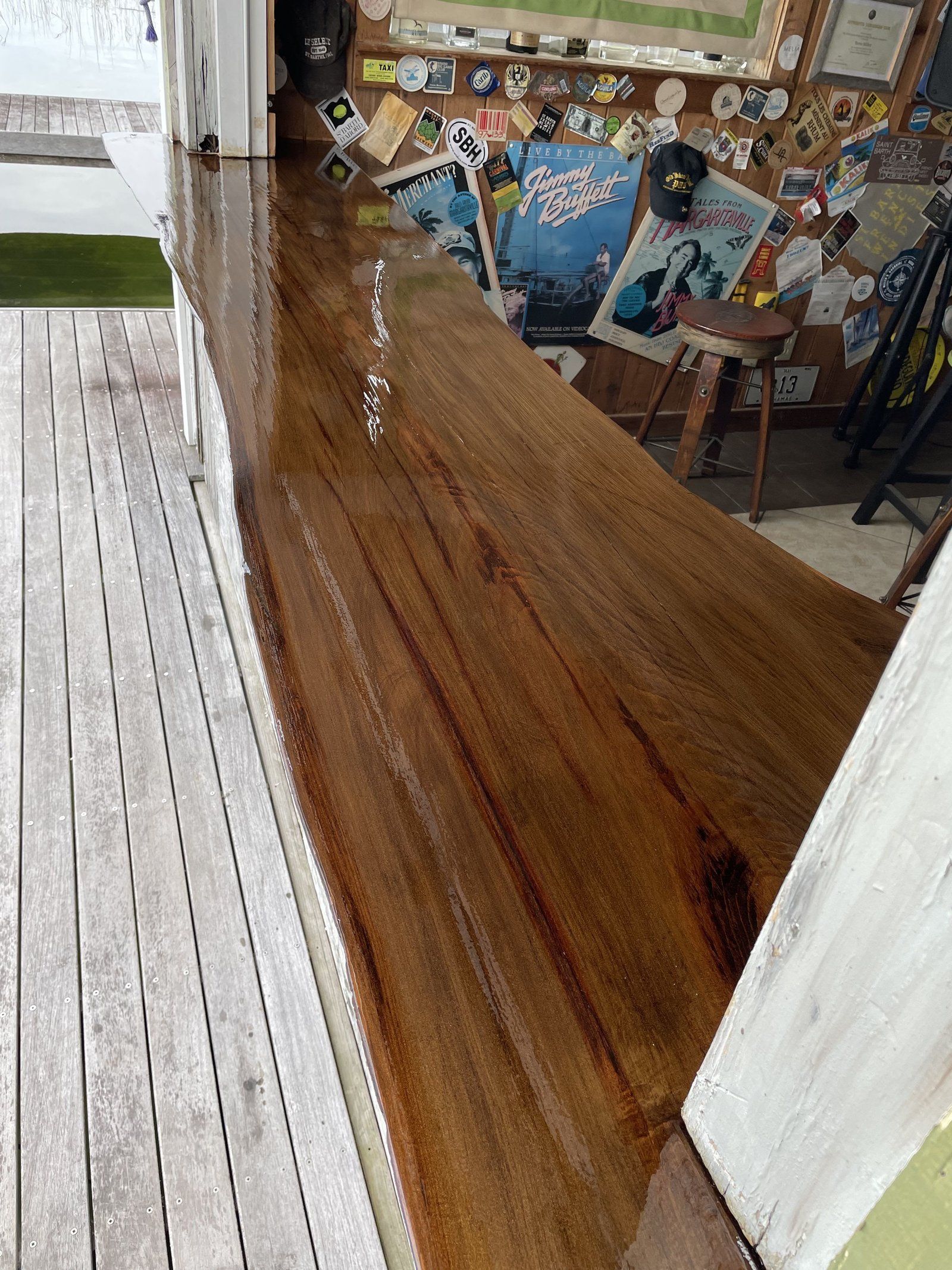 A wooden table is sitting on top of a wooden floor in a room.