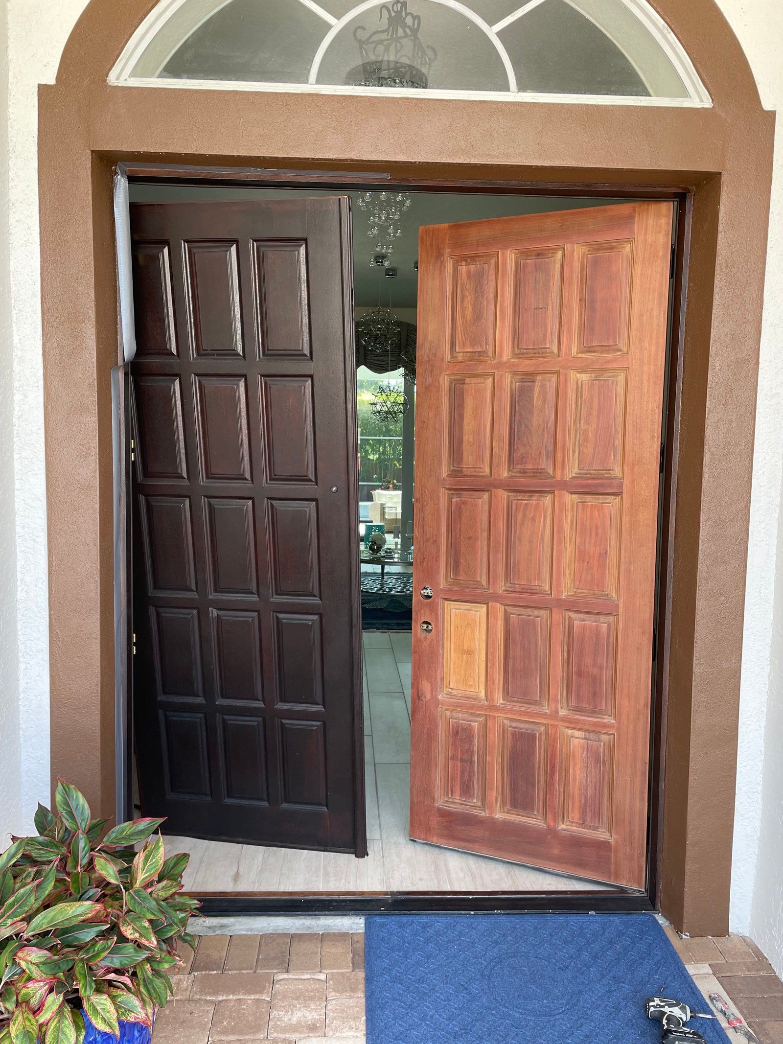 The front door of a house with the doors open