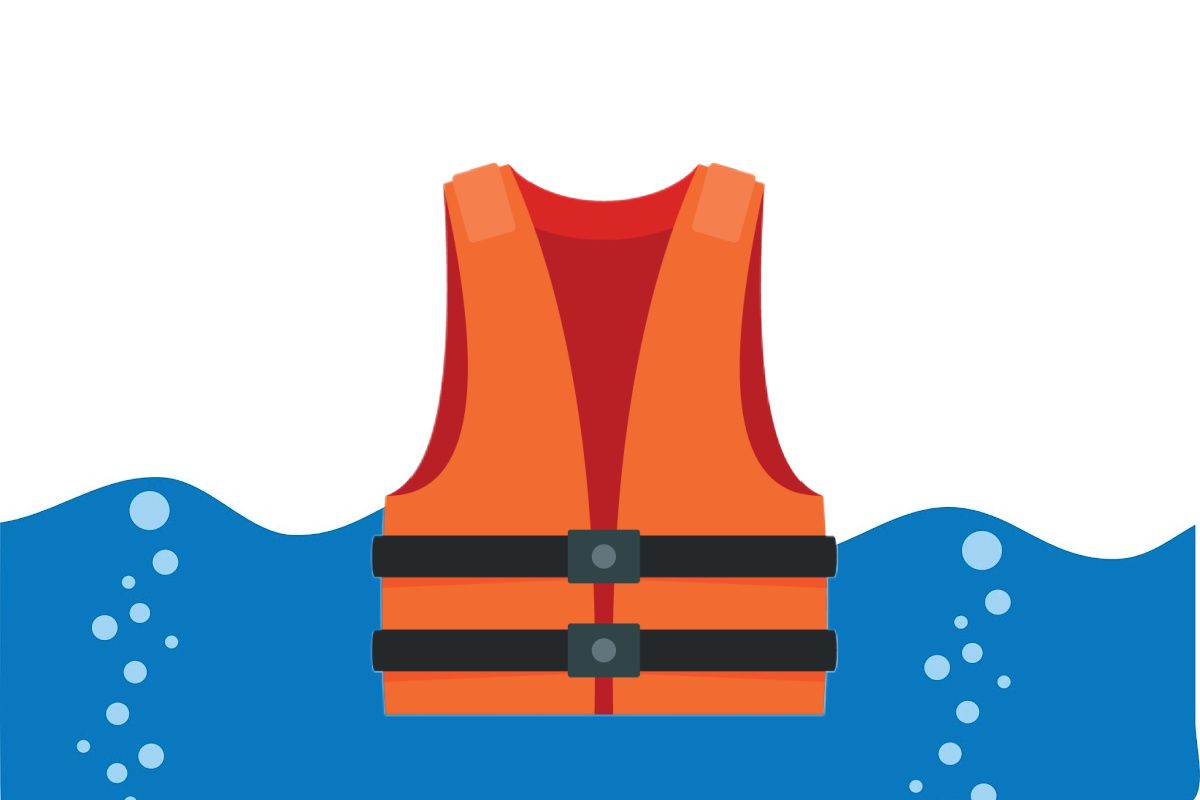 An orange life jacket is floating in the water.