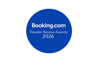 Blue circle logo for the Booking.com Traveler Review Awards 2026.