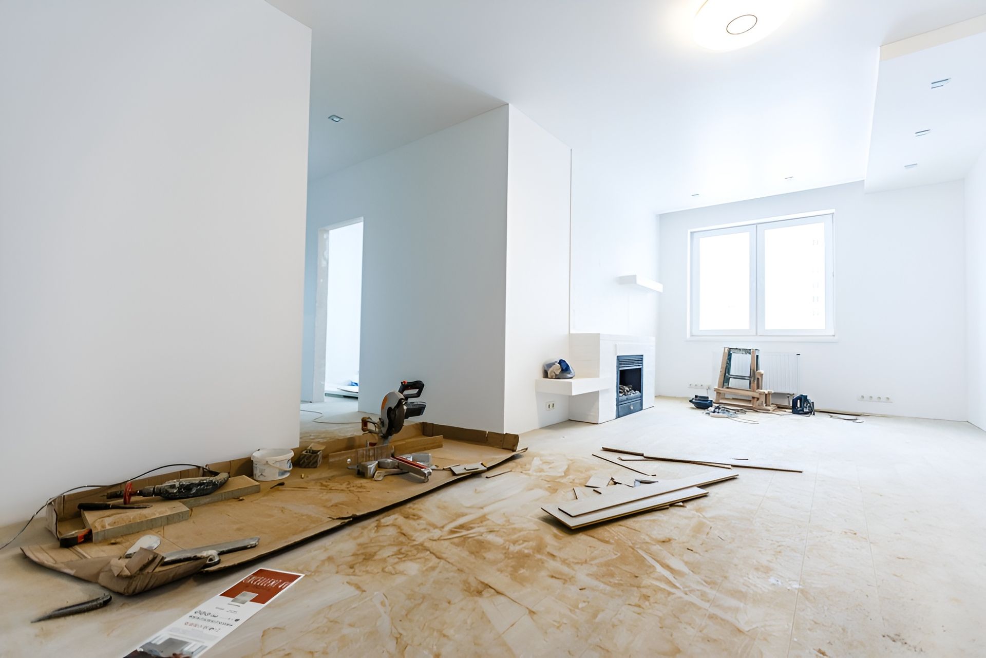 Room Under Renovation with Exposed Flooring and Construction Debris — Frenchy’s Plaster & Paint in Humpty Doo, NT