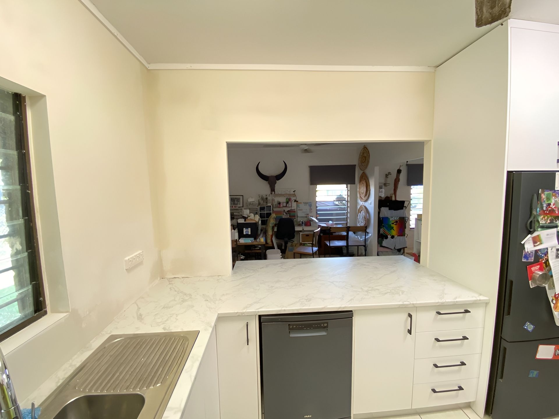 Kitchen Interior with A Pass-Through to Another Room — Frenchy’s Plaster & Paint in Bellamack, NT