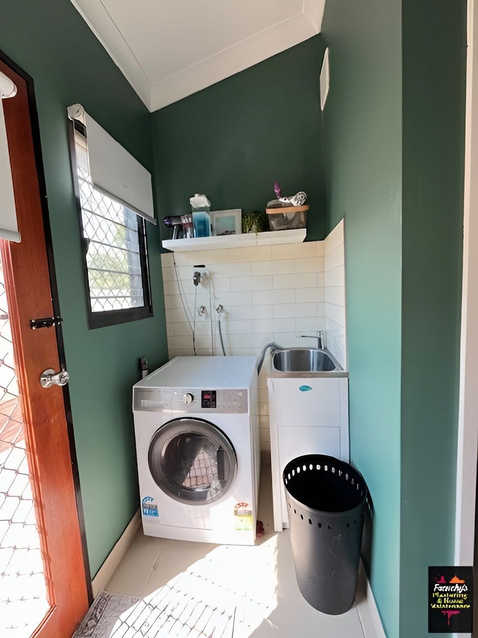 Small Laundry Room with Washing Machine, Sink, and Dark Green Walls — Frenchy’s Plaster & Paint in Bellamack, NT