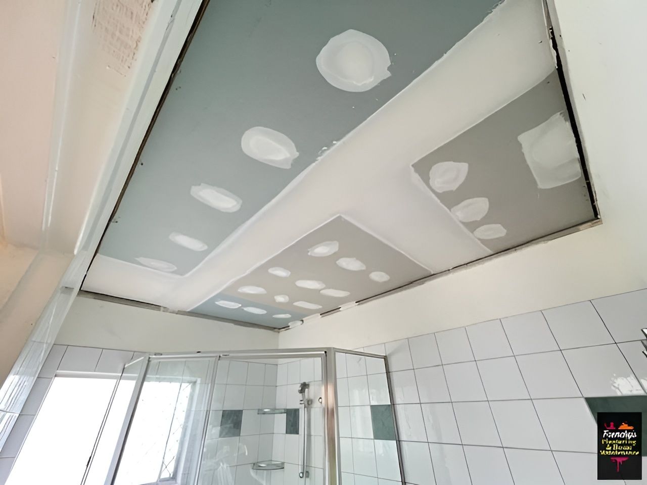 Bathroom Ceiling with Unfinished Drywall Installed, White Walls and Shower — Frenchy’s Plaster & Paint in Bellamack, NT