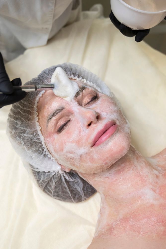 Person Receiving Facial Treatment — Gorjess Aesthetics in Corrimal, NSW