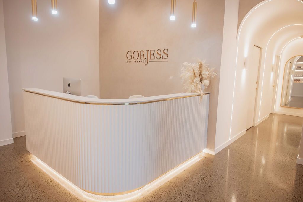 A Woman is Getting a Facial Treatment in a Beauty Salon — Gorjess Aesthetics in Corrimal, NSW