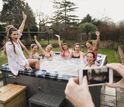 Ladies in Hot Tub — Portage, MI — Michigan Swim Pool & Spa