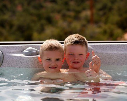 Kids in Hot Tub — Portage, MI — Michigan Swim Pool & Spa