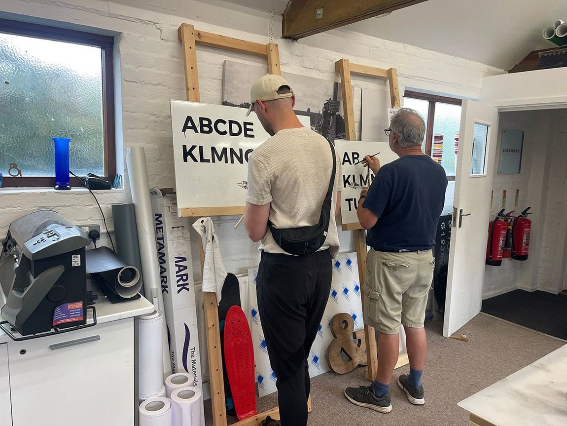 Learn sign writing with the Sign Painter in Woking