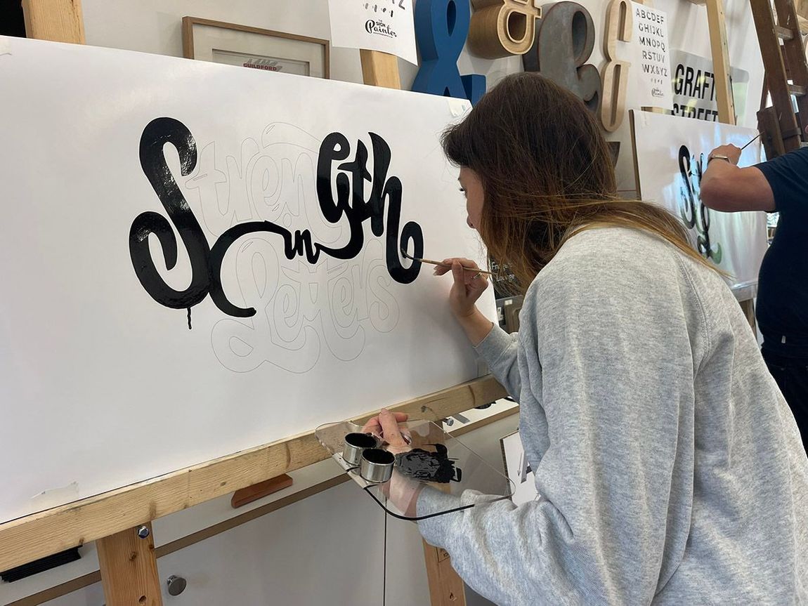 Sign writing lessons in Woking