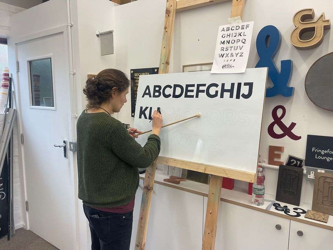 Learn the art of signwriting in Woking, Surrey