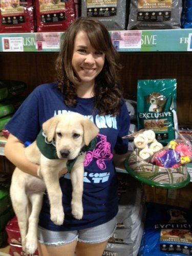 Woman with Dog — Clifton, TX — Clifton Feed and Service