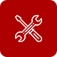 A pair of wrenches crossed over each other on a red background.