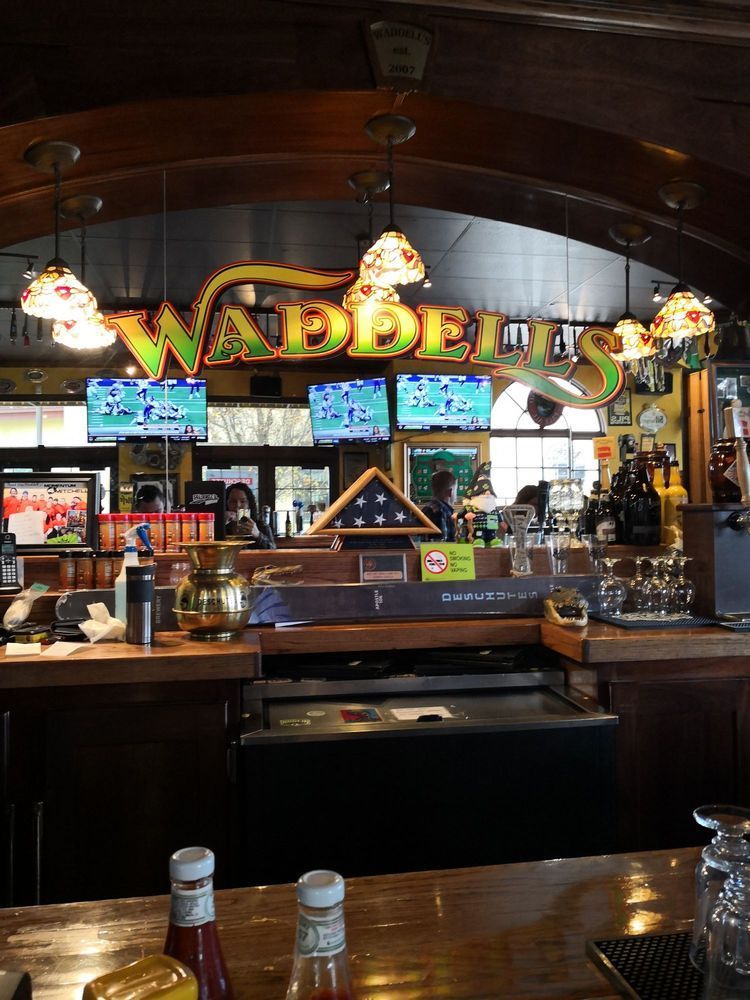 A bar with a sign that says wabbe 's on it