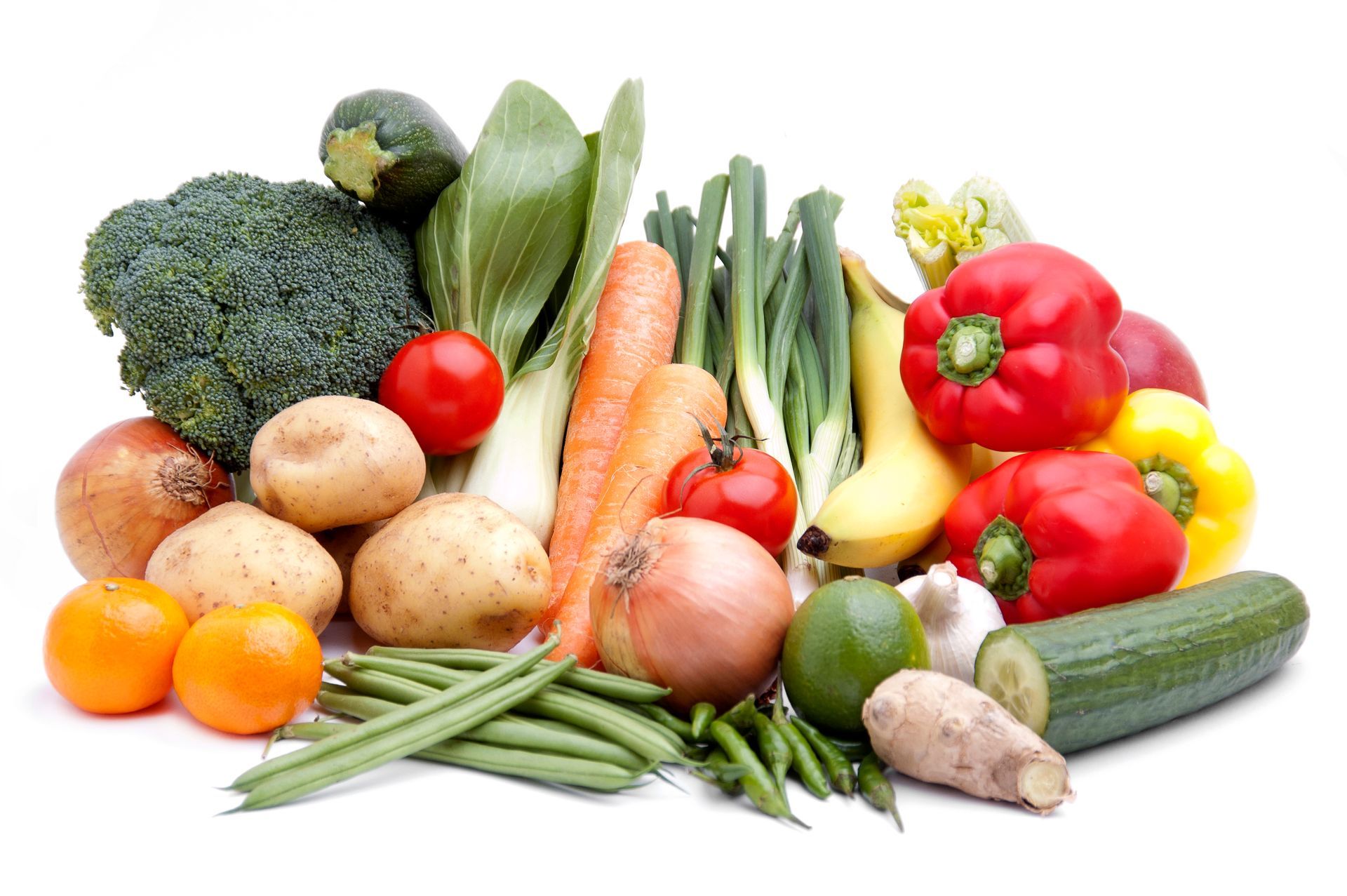 A variety of fruits and vegetables on a white background
