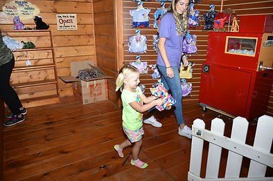 Kid Enjoying The Build A Friend Area — Liberty, MO — Fun Run