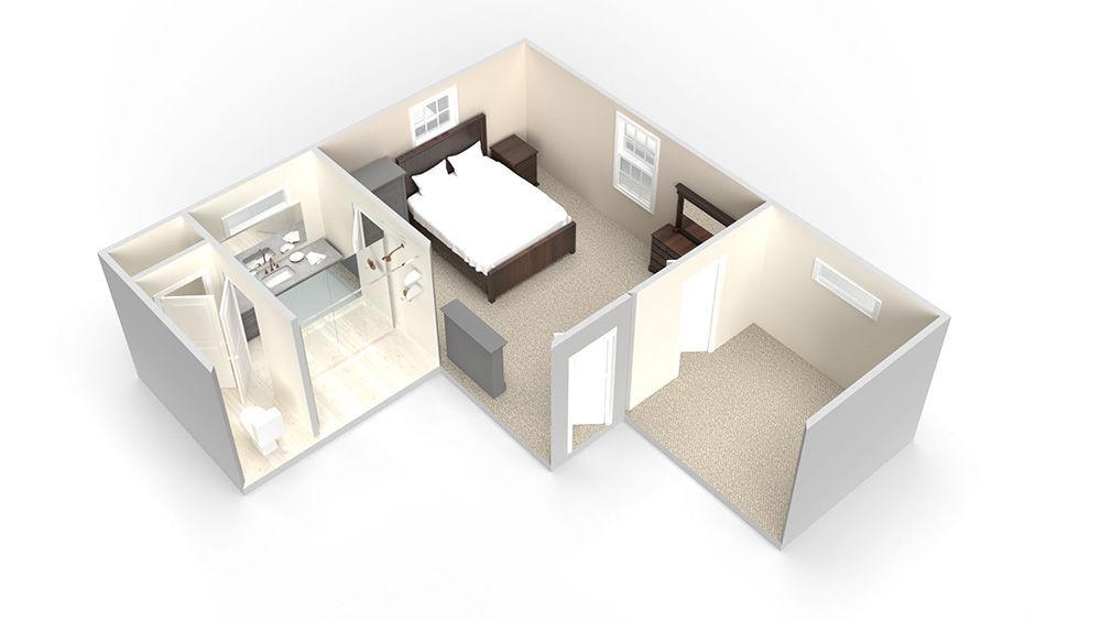 An aerial view of a bedroom and bathroom in a house.