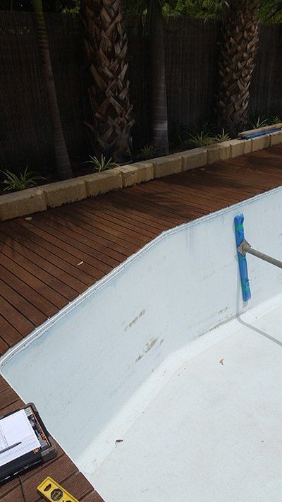 side of white fibreglass pool