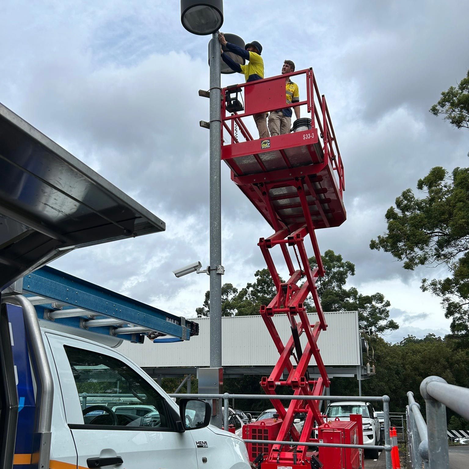 Industrial Electrians On A Crane