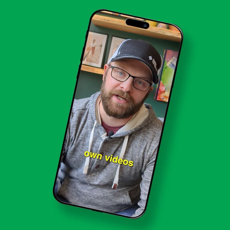 Video of Justin Vajko playing on a phone against a green background