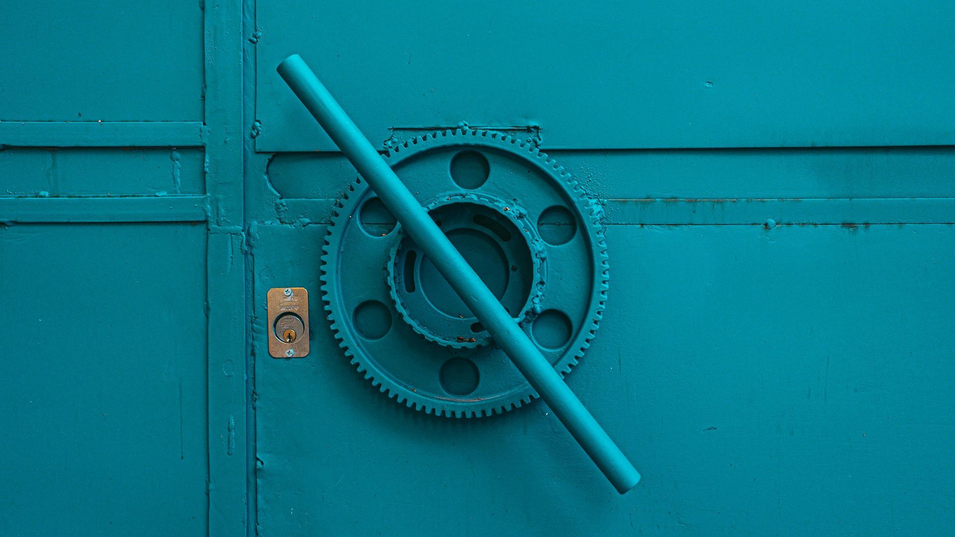 Teal blue handle turned at an angle