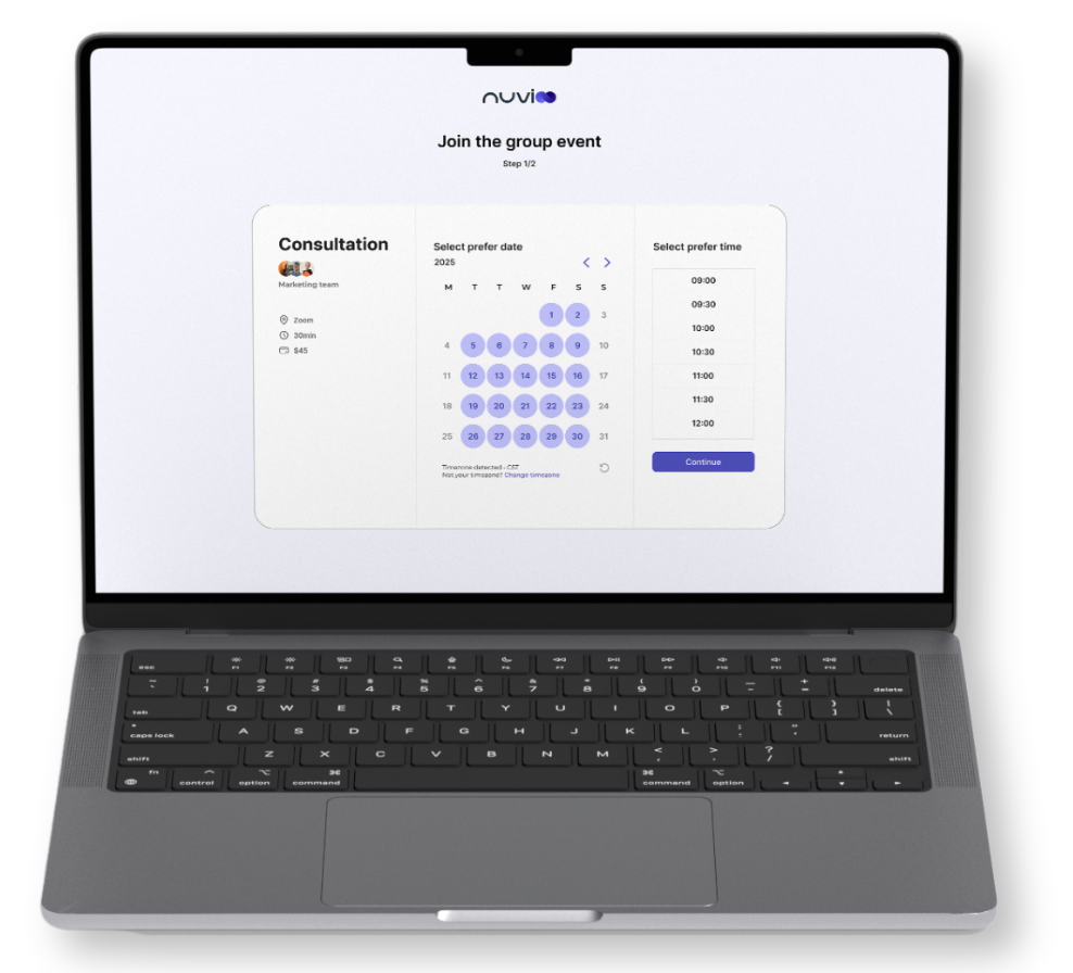 Laptop displaying a consultation scheduling interface with available time slots highlighted.