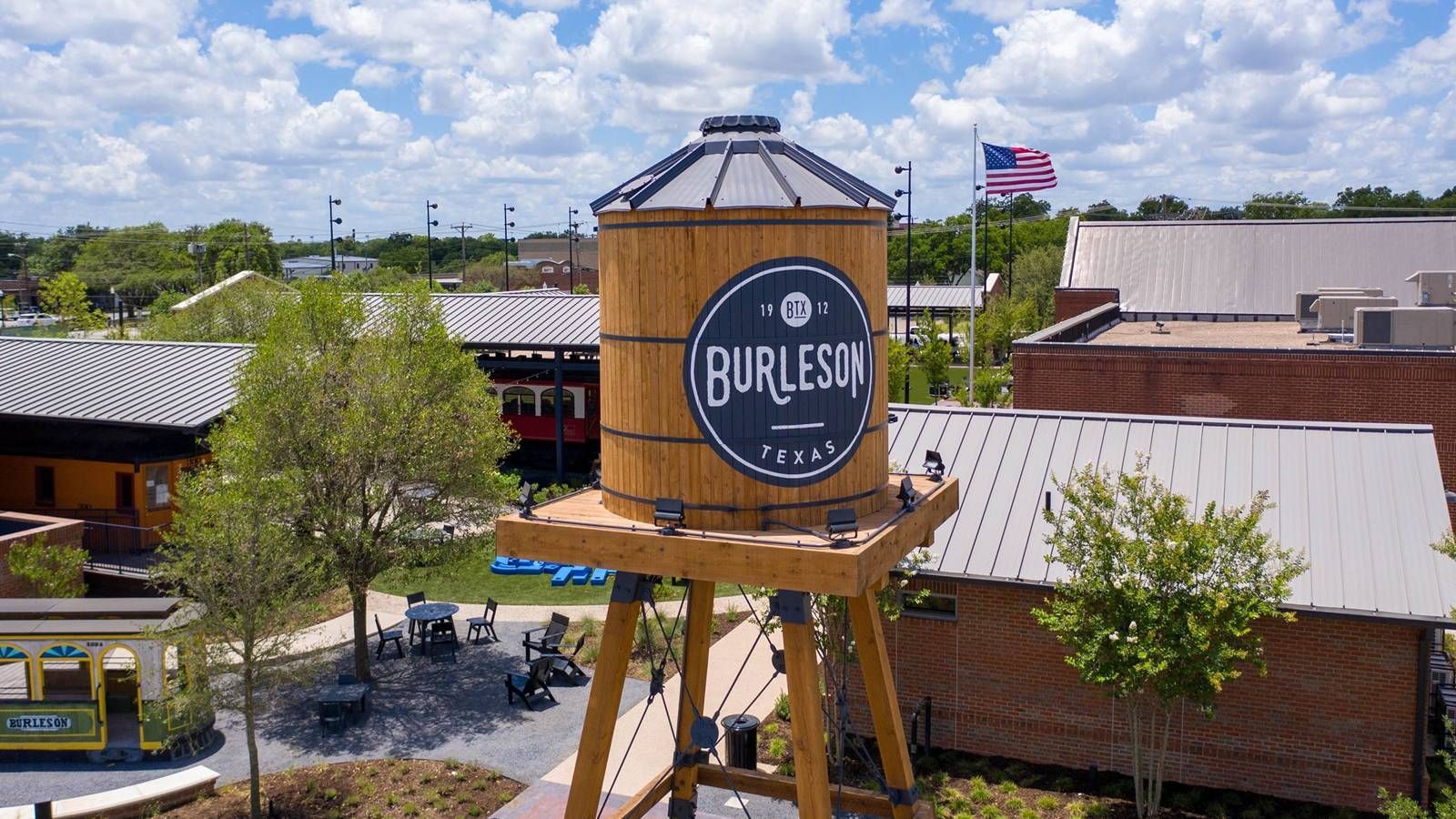 Burleson, TX water tower — iconic landmark near local neighborhoods and homes.