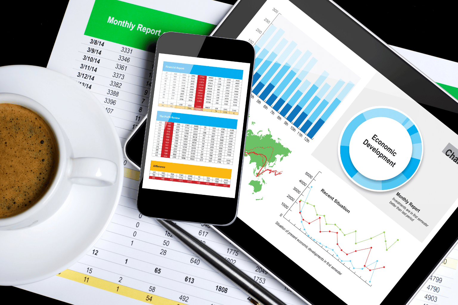 Two professionals reviewing charts and graphs for the July 2025 Burleson and Johnson County TX housing market report