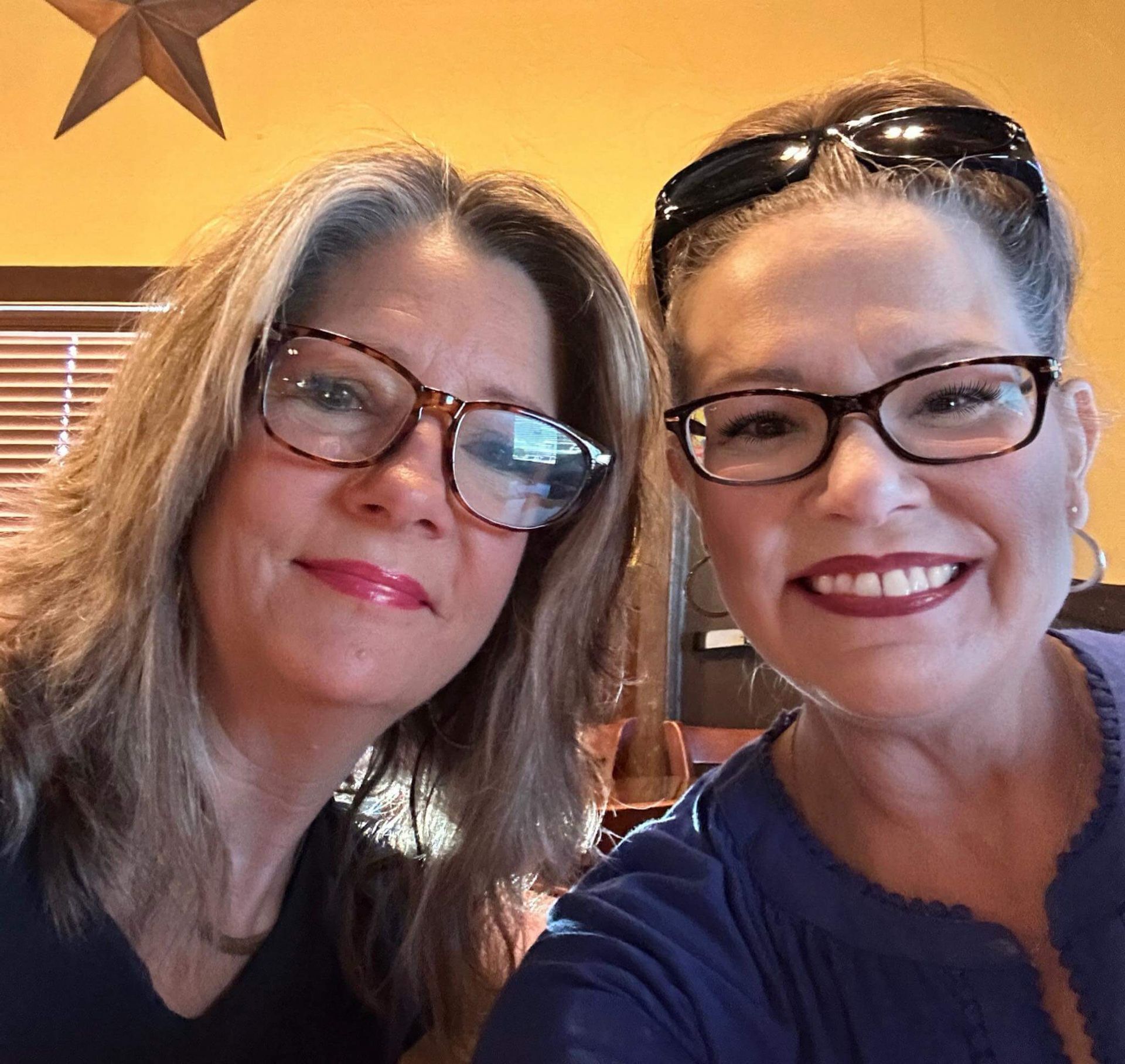 Jennifer Greenfield with broker Penni Boot during a Burleson Realtor mentoring breakfast.