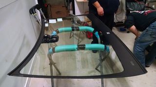 Backglass Repairs — Mechanics Changing the Broken Windshield in Staten Island, NY