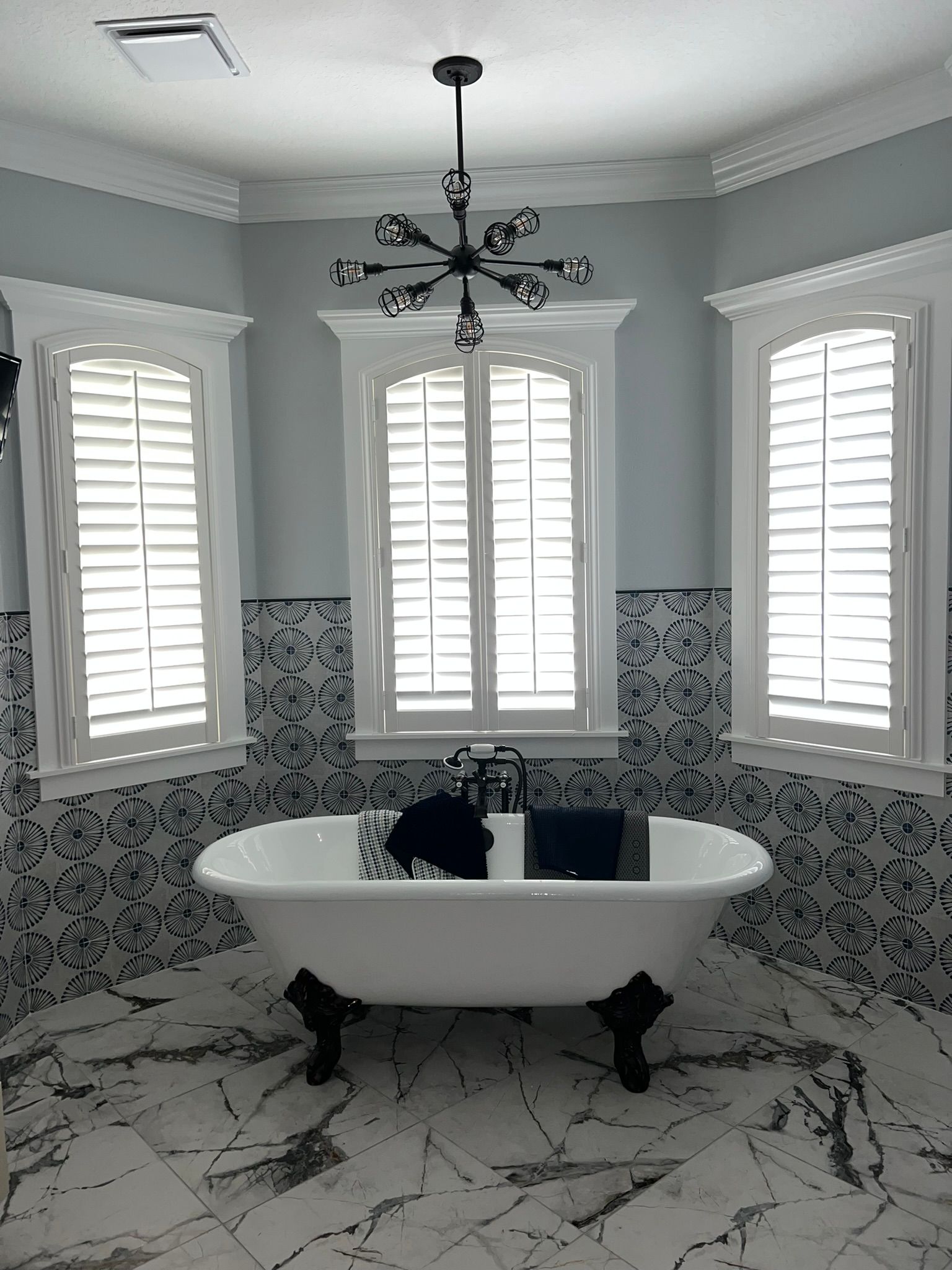 White Themed Bathroom With Window Shutters - New Port Richey, FL - Tampa Bay Shutters & Blinds LLC
