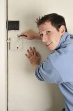 Our emergency 24 hour locksmith in Adelaide working on fixing a lock
