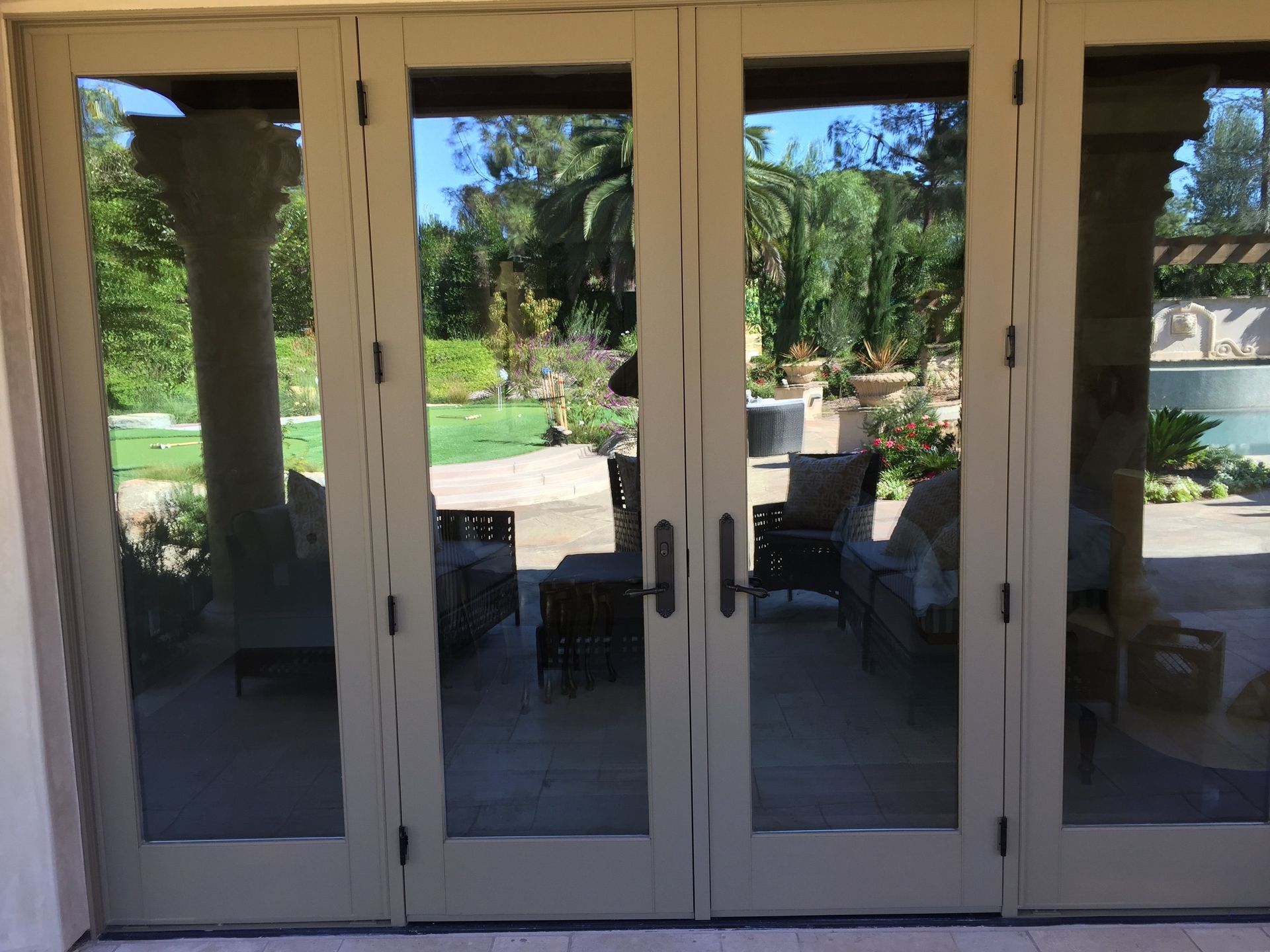 A set of sliding glass doors leading to a patio.
