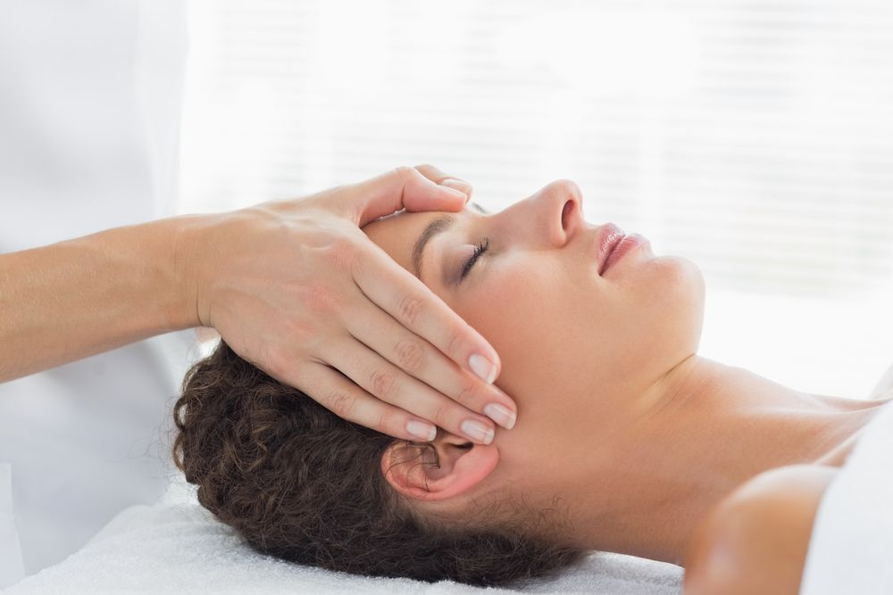 Person Receiving a Head Massage — Leela Thai Massage & Spa in Newtown, QLD