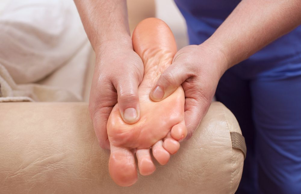 Person Massaging Someone's Foot — Leela Thai Massage & Spa in Newtown, QLD