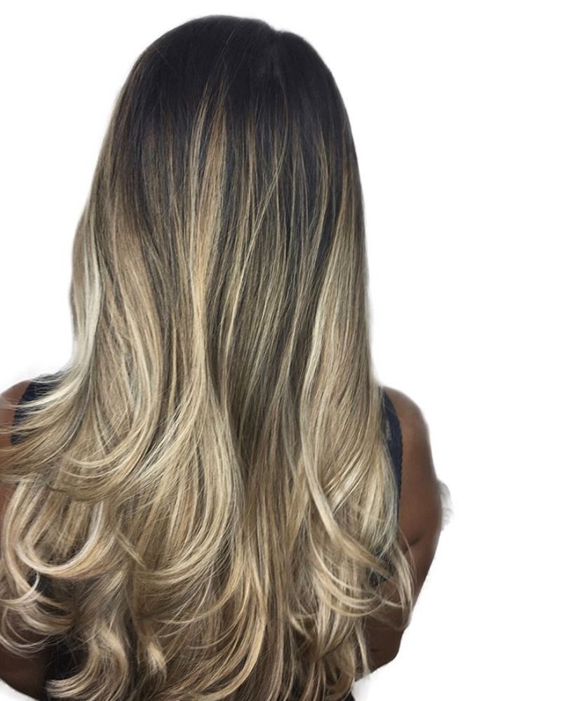 The back of a woman 's head with long blonde hair.